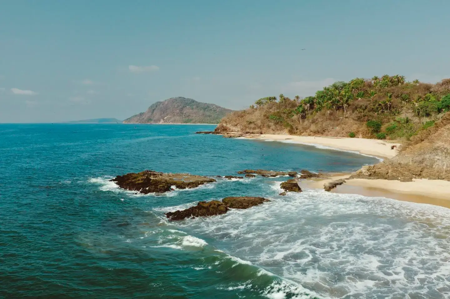 Rocky shoreline and beach in Nayarit, Mexico