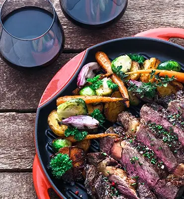 Colorful plated meal with grilled vegetables