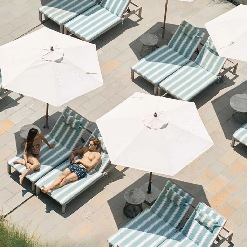 Guests Relaxing by the Pool