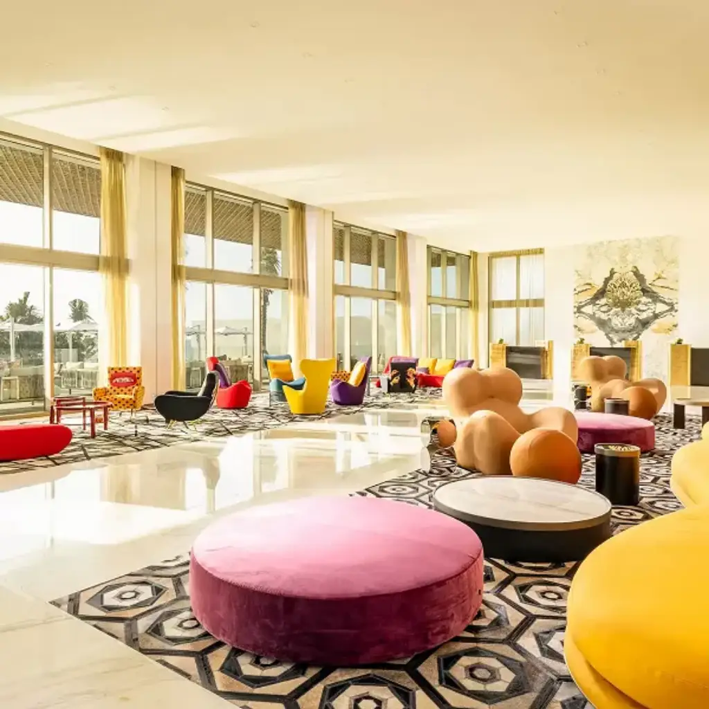 Lobby of Hotel Mousai Cancun with modern design, large abstract paintings,