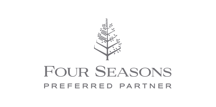 Four Seasons luxury travel partner logo