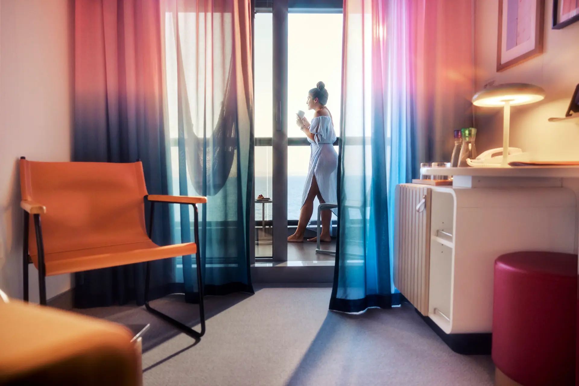 Virgin Voyages Cruise Line luxury ship lounge and ocean views with adults-only cruise atmosphere